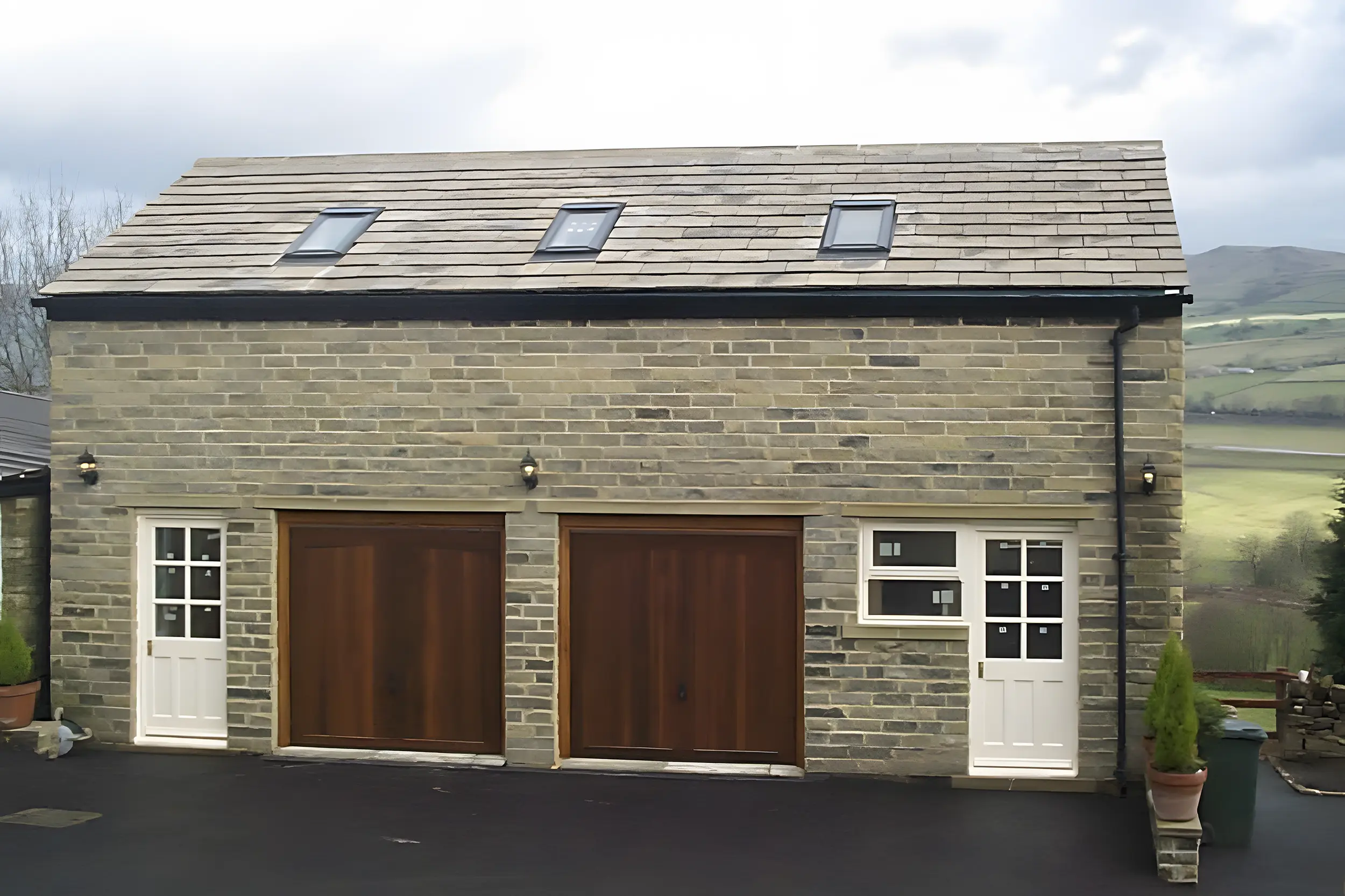 Black tumbled stone on a barn conversion